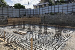  5-13-19  Holes dug, filled, base concrete poured, and rebar jungle starting to grow!.