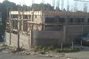 View from corner opposite the main face.  Corner of Rue Moise and Rue Acacia.